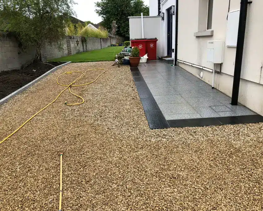 Elegant blend of gravel and granite with limestone edging